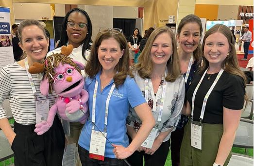 Smithsonian educators and National Head Start Association staff convened at the 2023 NHSA Conference in Phoenix, Arizona in May 2023 to share a teacher toolkit that highlights the program’s interdisciplinary approach. (From L-R: Beth Evans, Pinky the Jackalope puppet, Kisha McCray (Manager of Effective Practices, NHSA), Rachel Hutchison (Senior Associate of Instructional Practice Professional Development, NHSA), Maureen Leary, Emily Porter, and Bethany Wells). Courtesy of the Smithsonian. Smithsonian educators article