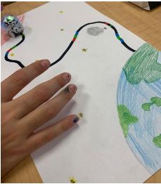 A student tests out their Ozobot code map illustrating a spacecraft’s journey from Earth to Mars. Maps include at least five different codes demonstrating different potential challenges or experiences encountered during a spacecraft’s journey to the red planet. for article on Smithsonian educators