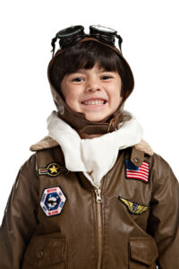 4 year old boy dressed up like a flying ace for WWI article