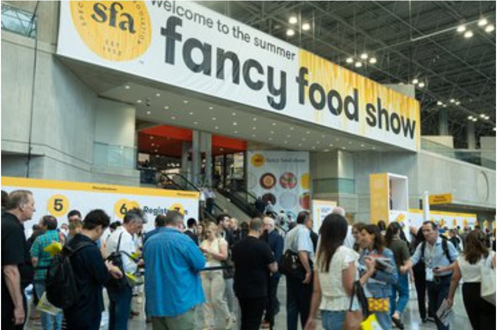 Attendees line up at The Specialty Food Association's Fancy Food Show