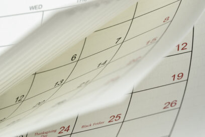 Close-up white paper desk calendar appointment and business meeting concept. for article on leadership tuneup