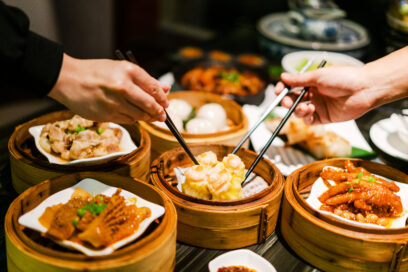 Many people are eating Guangzhou snacks and evening dining environment