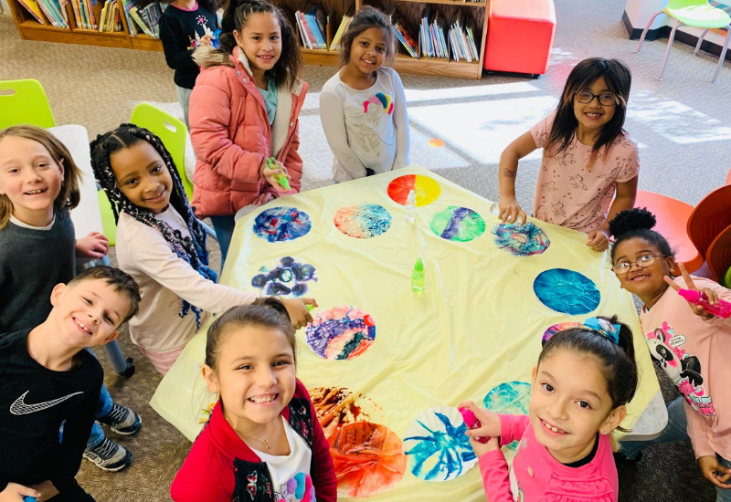 Students in art class at dual language school in Topeka, Kan., for article on Brown vs. Board