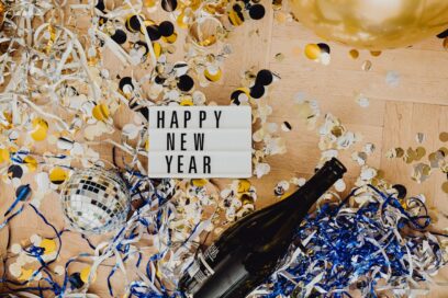 Happy New Year sign with confetti