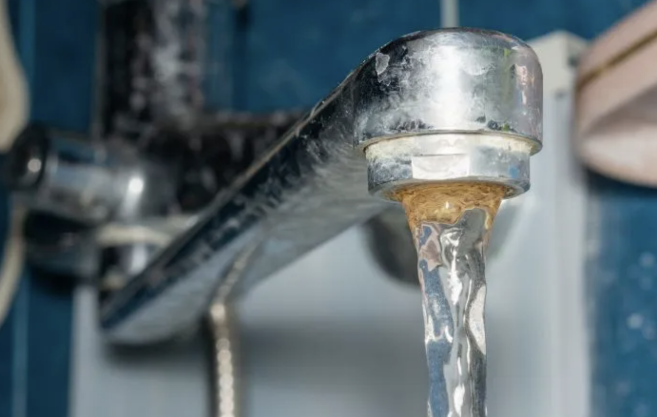 Water flowing from a faucet