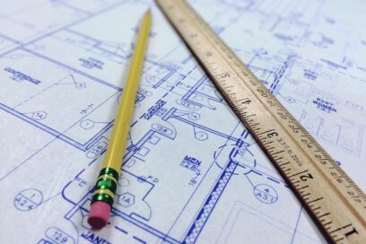 Blueprints and a ruler.