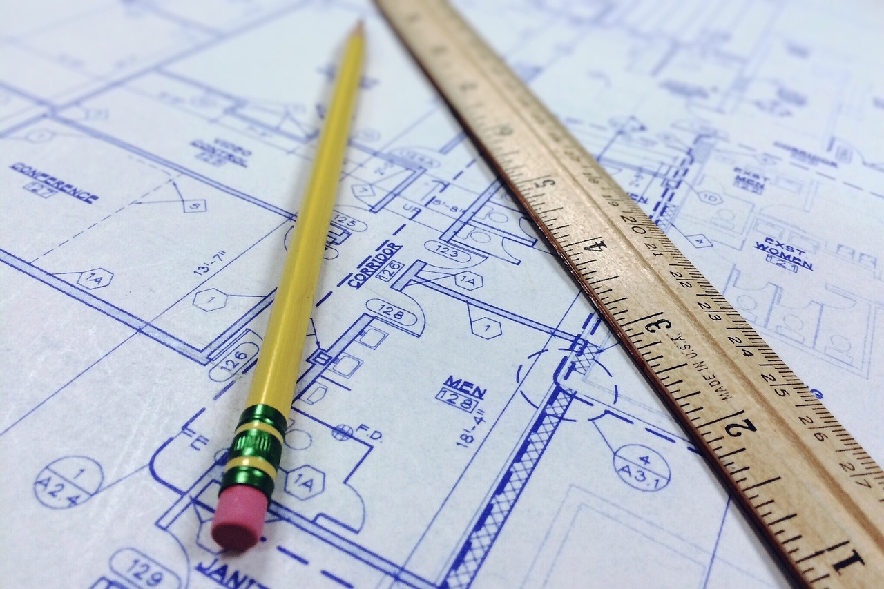 Blueprints and a ruler.