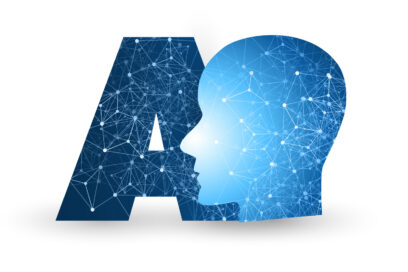 Bluish capital A with star-light lights next to a profile of a person, facing left, representing AI and Human interacion.