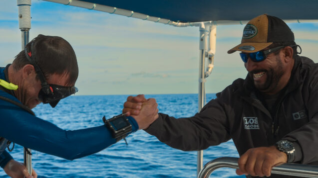 Host, Bertie Gregory, left, and skipper Gabriel Gabino Zarabia Mendivil celebrate after a successful dive. 